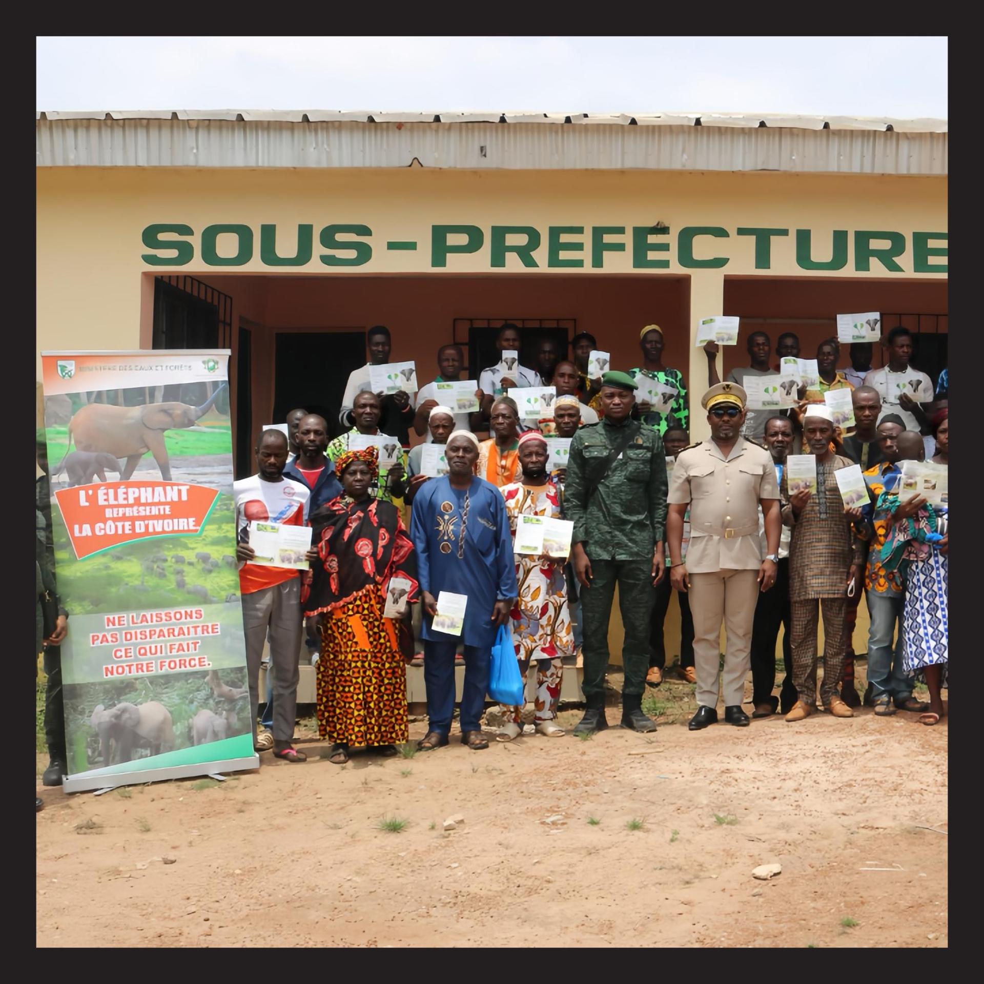Members of the Ivory Coast Ministry of Water and Forests with local community members whom they trained in elephant conservation