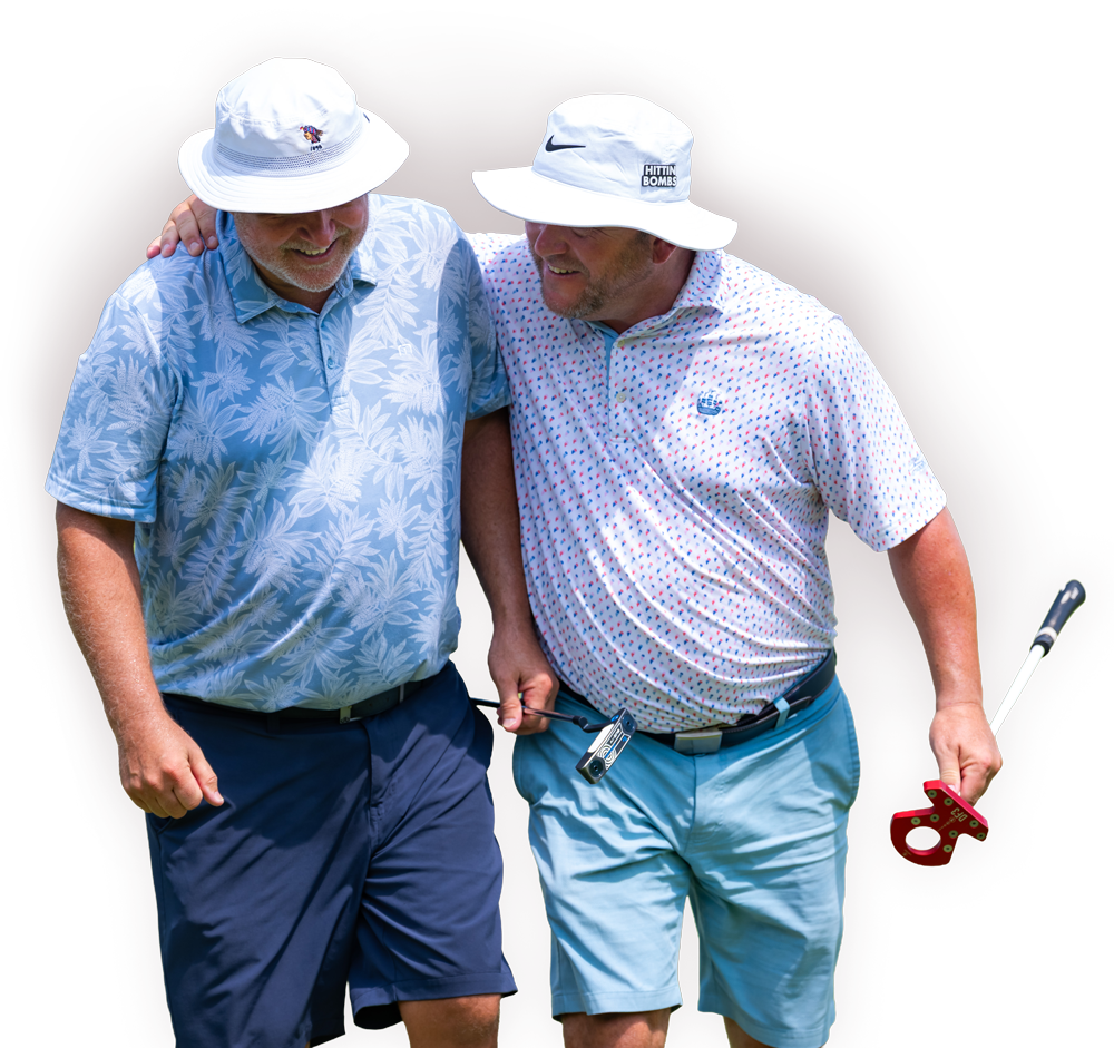 military veteran golfers smiling with their arms around each other